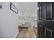 Welcoming entryway showcasing an open floor plan with seamless flow into the kitchen and living area at 649 W Perry Rd., Myrtle Beach, SC 29579