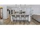 Kitchen with a big island, breakfast bar and stainless steel appliances at 649 W Perry Rd., Myrtle Beach, SC 29579