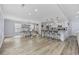 Bright open concept kitchen and dining area with hardwood flooring at 649 W Perry Rd., Myrtle Beach, SC 29579