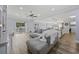 Comfortable living room with plush seating and sliding doors to the backyard at 649 W Perry Rd., Myrtle Beach, SC 29579