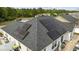 Energy-efficient home featuring modern solar panels on a well-maintained roof, promoting sustainability at 649 W Perry Rd., Myrtle Beach, SC 29579