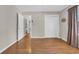A bright and spacious bedroom featuring wood flooring and a closet for ample storage at 6612 Wintergreen Point, Myrtle Beach, SC 29588