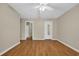 Bright, spacious bedroom with wood floors, neutral walls, and a ceiling fan at 6612 Wintergreen Point, Myrtle Beach, SC 29588