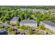 Scenic aerial view of a condo community near a golf course and waterways at 683 Riverwalk Dr. # 302, Myrtle Beach, SC 29579