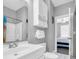A clean bathroom with modern fixtures and a shower/tub combo and view into bedroom at 683 Riverwalk Dr. # 302, Myrtle Beach, SC 29579