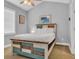 Comfortable bedroom with a queen-size bed and beach-themed decor, creating a relaxing coastal atmosphere at 683 Riverwalk Dr. # 302, Myrtle Beach, SC 29579