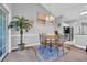 Charming dining area with seating for four and adjacent access to the kitchen, bright and inviting at 683 Riverwalk Dr. # 302, Myrtle Beach, SC 29579