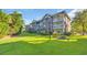 Beautiful condo with expansive green lawn and lovely screened-in porches at 683 Riverwalk Dr. # 302, Myrtle Beach, SC 29579