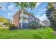 Beautiful condo building showcasing a well-manicured lawn and lovely balconies at 683 Riverwalk Dr. # 302, Myrtle Beach, SC 29579