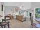 Inviting living room with vaulted ceiling, comfortable seating, and lots of natural light at 683 Riverwalk Dr. # 302, Myrtle Beach, SC 29579
