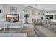Comfortable living space offering a relaxing ambiance with a smooth transition to the dining room at 683 Riverwalk Dr. # 302, Myrtle Beach, SC 29579
