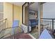 Balcony view into living room with comfortable seating and ocean views at 6900 Ocean Blvd. # 935, Myrtle Beach, SC 29572
