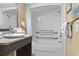 Neutral bathroom featuring granite counters, a shower-tub combo and ADA accessibility features at 6900 Ocean Blvd. # 935, Myrtle Beach, SC 29572