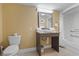 Bathroom with a single sink vanity, granite countertop, and a shower/tub combination at 6900 Ocean Blvd. # 935, Myrtle Beach, SC 29572