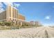 Expansive beach view showcasing the beachfront location and the beautiful resort at 6900 Ocean Blvd. # 935, Myrtle Beach, SC 29572