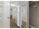 Fully equipped galley kitchen with modern appliances next to closet space and door to rooms at 6900 Ocean Blvd. # 935, Myrtle Beach, SC 29572
