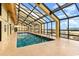 Indoor pool featuring a glass ceiling that allows ample natural light at 6900 Ocean Blvd. # 935, Myrtle Beach, SC 29572