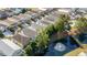 An elevated shot showing homes near a tranquil pond with a fountain, enhanced by lush greenery and mature trees at 708 Ashland Ave., North Myrtle Beach, SC 29582