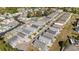 An aerial view showcases a neighborhood featuring charming homes, community pool, and well-manicured landscaping at 708 Ashland Ave., North Myrtle Beach, SC 29582