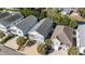 An aerial view captures raised beach homes with breezy screened porches and meticulous landscaping at 708 Ashland Ave., North Myrtle Beach, SC 29582