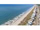 Breathtaking aerial view of oceanfront properties along a pristine sandy beach at 708 Ashland Ave., North Myrtle Beach, SC 29582