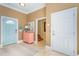 Welcoming entryway with colorful doors, chest, and rug creating an inviting entrance at 708 Ashland Ave., North Myrtle Beach, SC 29582