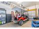 Spacious garage with a golf cart parked inside with plenty of room for storage at 708 Ashland Ave., North Myrtle Beach, SC 29582