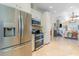 Modern kitchen featuring stainless steel appliances, marble floors, ample counter space, and open layout at 708 Ashland Ave., North Myrtle Beach, SC 29582