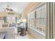 Bright living area featuring a vaulted ceiling, comfortable seating, neutral decor, and expansive windows at 708 Ashland Ave., North Myrtle Beach, SC 29582