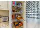 Organized pantry featuring adjustable shelving for storage, offering a convenient and efficient space at 708 Ashland Ave., North Myrtle Beach, SC 29582