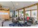 Inviting covered patio with comfortable seating, string lights, and coastal-themed decor at 708 Ashland Ave., North Myrtle Beach, SC 29582