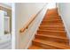 Classic wooden staircase with carpet runner leading to upper level, great natural light at 708 Ashland Ave., North Myrtle Beach, SC 29582
