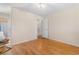 Bright, empty bedroom with hardwood floors and a closet at 808 Atlantic Commons Dr., Surfside Beach, SC 29575