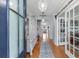 Elegant foyer with hardwood floors, decorative furnishings, and an inviting view into the main living space at 808 Atlantic Commons Dr., Surfside Beach, SC 29575