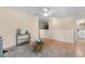 Spacious living room featuring hardwood floors, ceiling fan and an elegant area rug at 808 Atlantic Commons Dr., Surfside Beach, SC 29575