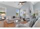 Bright living room with hardwood floors, a vaulted ceiling, and comfortable seating at 808 Atlantic Commons Dr., Surfside Beach, SC 29575