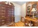 A classic office space featuring a wooden desk and lots of storage at 808 Atlantic Commons Dr., Surfside Beach, SC 29575