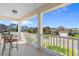 Inviting front porch with seating and views of the neighborhood at 808 Atlantic Commons Dr., Surfside Beach, SC 29575