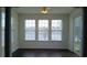 Bright dining area with hardwood floors, ceiling fan and sliding glass door at 843 Brookline Dr., Myrtle Beach, SC 29579