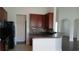 Well-equipped kitchen with dark cabinetry and ample countertop space at 843 Brookline Dr., Myrtle Beach, SC 29579