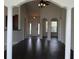 Inviting living area featuring hardwood floors and elegant architectural columns at 843 Brookline Dr., Myrtle Beach, SC 29579