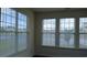 This sunroom has a view of the lake and the outdoors at 843 Brookline Dr., Myrtle Beach, SC 29579