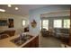 Open kitchen with ample counter space seamlessly connects to the living area, perfect for entertaining guests at 861 Tall Oaks Ct. # D-61, Myrtle Beach, SC 29588