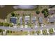 Aerial view of attractive homes with well-kept lawns and long driveways on a quiet street at 886 Carolina Farms Blvd., Myrtle Beach, SC 29579