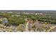 Aerial view of home in a picturesque community with ponds, mature trees, and meticulously landscaped yards at 886 Carolina Farms Blvd., Myrtle Beach, SC 29579