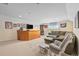 Finished basement with a bar area, comfortable seating, and a window for natural light at 886 Carolina Farms Blvd., Myrtle Beach, SC 29579
