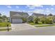 Lovely single-story home with a well-kept lawn and an attached two-car garage at 886 Carolina Farms Blvd., Myrtle Beach, SC 29579
