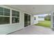 Inviting screened porch provides a relaxing outdoor space with views of the backyard and surrounding greenery at 889 Ireland Dr., Longs, SC 29568
