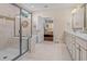Spacious bathroom features a tub, shower with glass enclosure, and dual sink vanity at 9169 Nw Oldfield Rd., Calabash, NC 28467