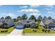 Inviting single-Gathering home with a manicured lawn, mature trees and an attached two-car garage at 9169 Nw Oldfield Rd., Calabash, NC 28467